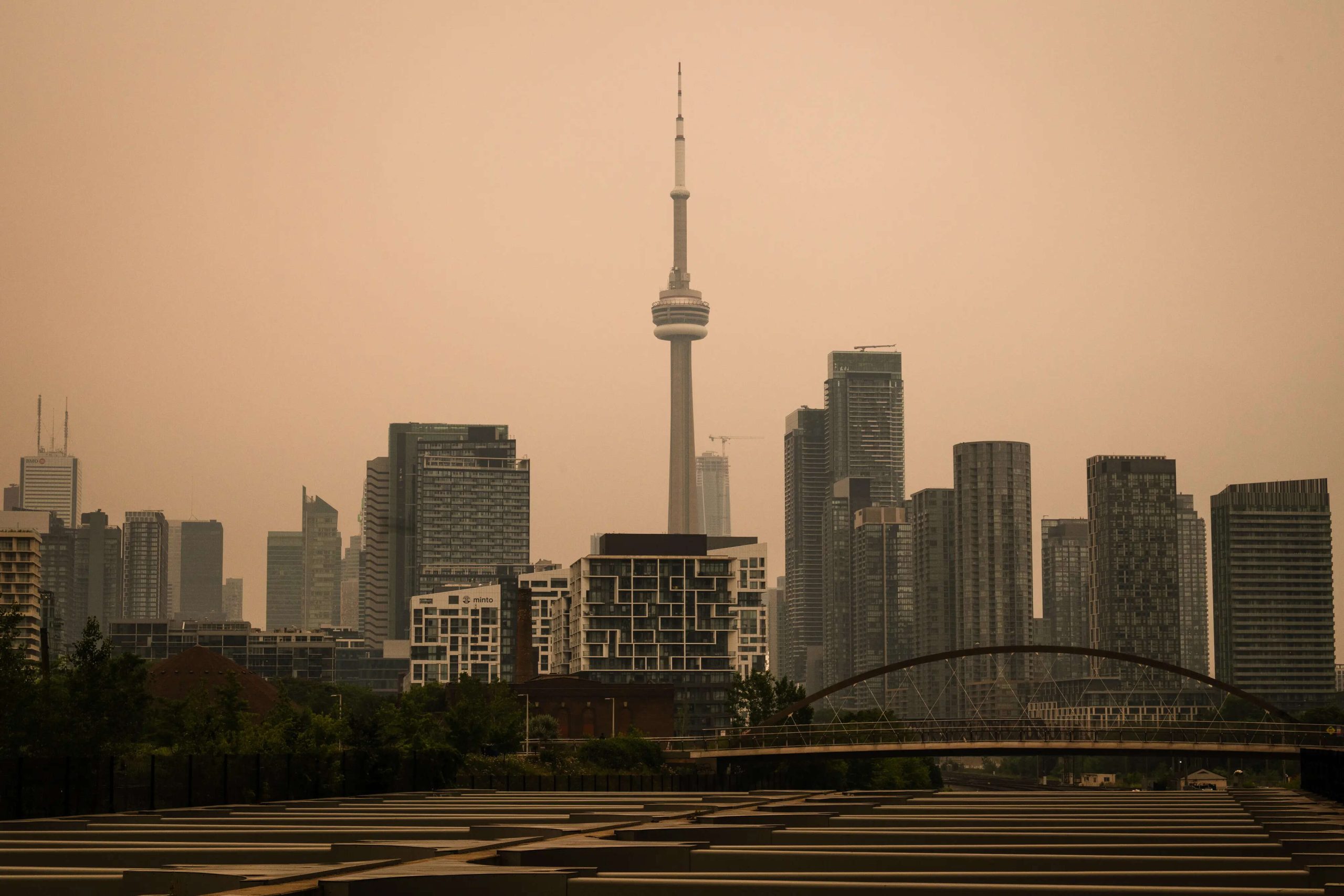 The CN Tower is pictured in Toronto as wildfire smoke fills the city