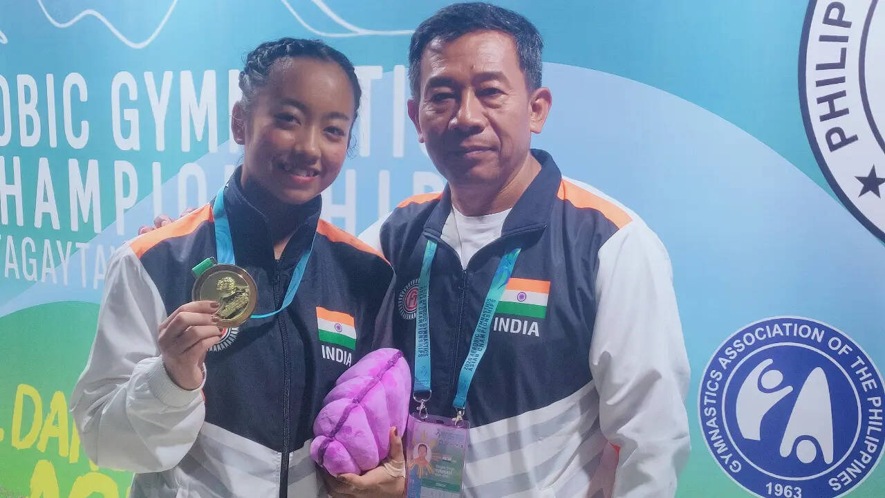 Ariha with coach Yumnam Ranjan Singh